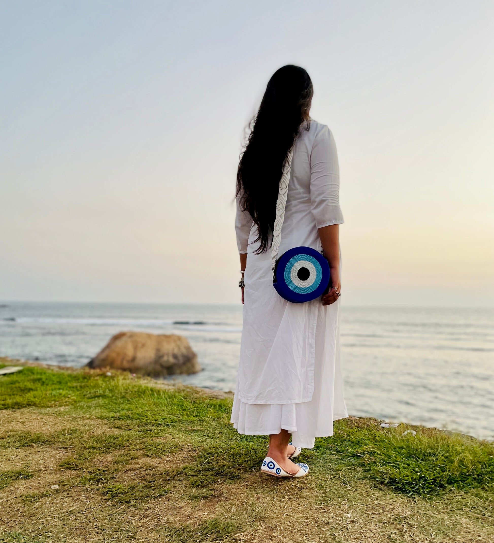 Women carrying Fitoori Banjaaran's Paros Evil Eye Sling Bag