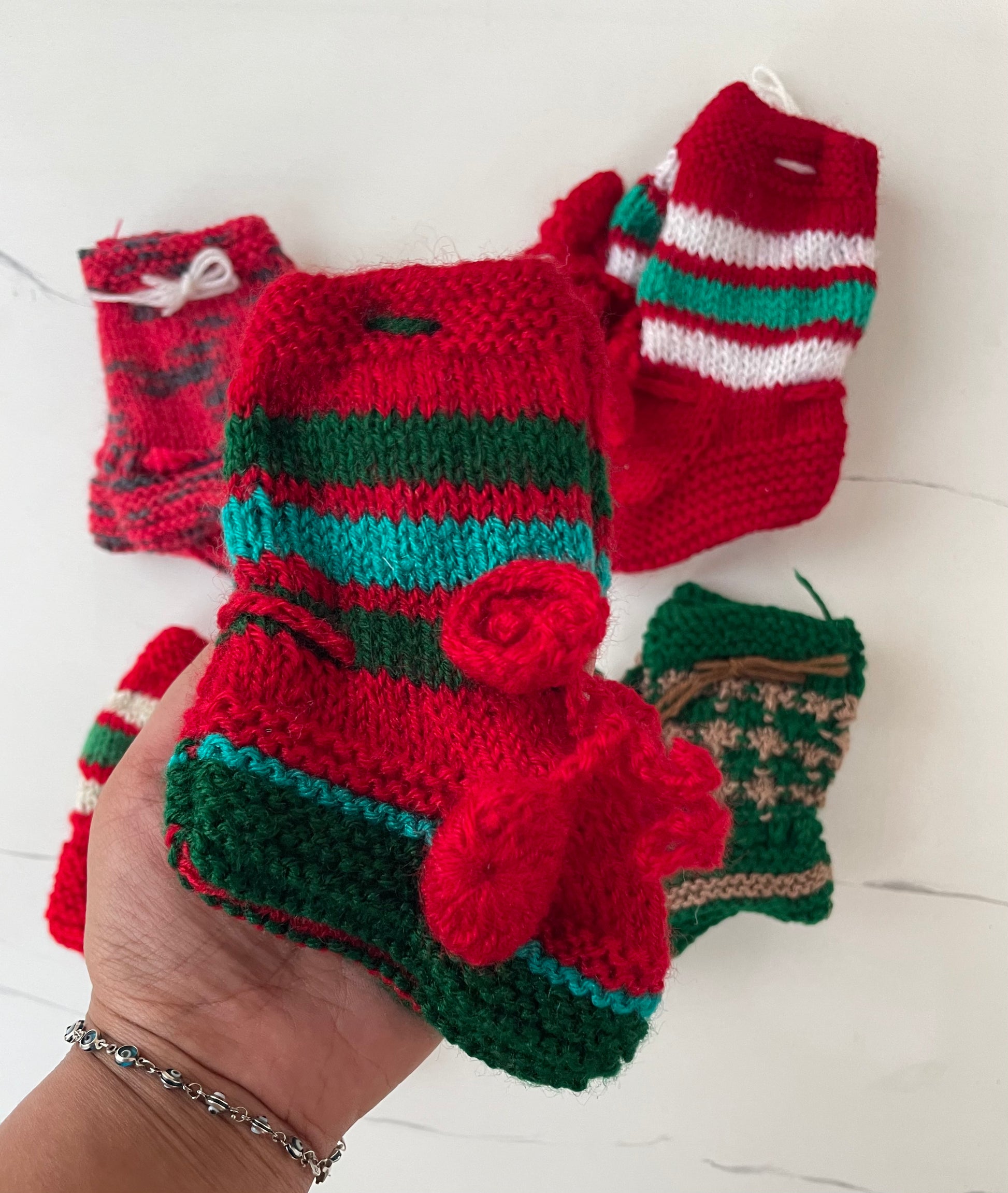 Fitoori Banjaaran's Hand Knitted Baby Socks for Christmas Decor