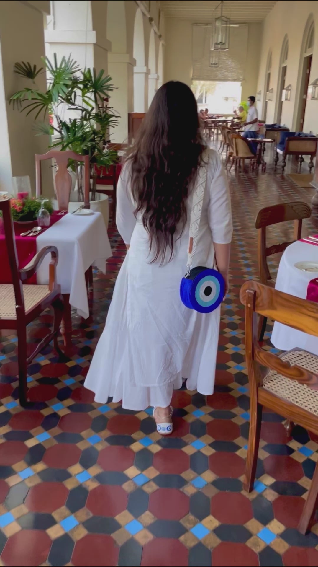 Women carrying Fitoori Banjaaran's Paros Evil Eye Sling Bag